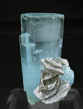 Beryl (variety aquamarine) with Muscovite. Rear