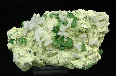 Andradite (variety demantoid) with Quartz. 