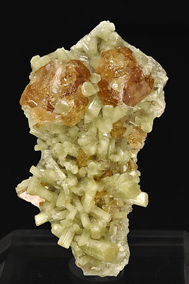 Grossular (variety hessonite) with Diopside. 