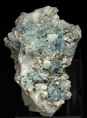 Fluorapatite with Bertrandite, Albite, Muscovite and Quartz.