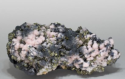 Rhodochrosite with Sphalerite, Galena, Chalcopyrite and Calcite.