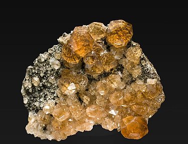 Grossular (variety hessonite) with Clinochlore.