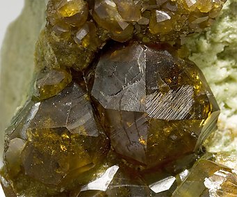 Andradite (variety topazolite) with Quartz. 