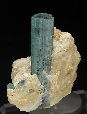 Elbaite (variety indicolite) with Quartz and Muscovite. 