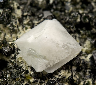 Gismondine with Calcite, Epidote and Chlorite. 