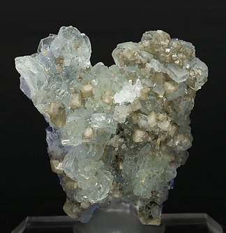 Zoisite (variety tanzanite) with Prehnite and Chabazite. Rear