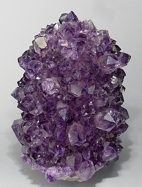 Quartz (variety amethyst) with Calcite.