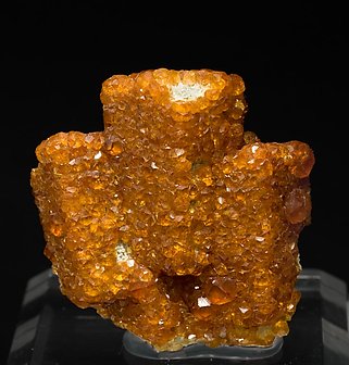 Spessartine on Feldspar.