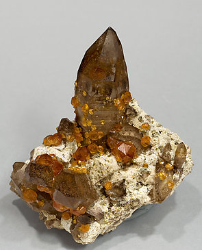 Spessartine with smoky Quartz.