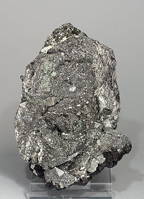 Löllingite with Arsenopyrite, Magnetite, Fluorite and Calcite. 