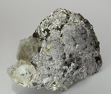 Löllingite with Fluorite, Magnetite and Calcite.