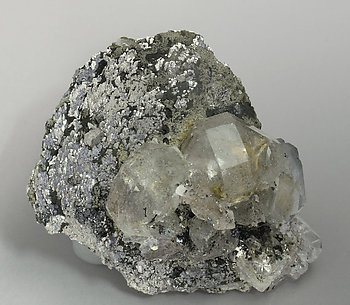 Löllingite with Fluorite, Magnetite and Calcite. Rear