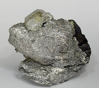 Löllingite with Fluorite, Magnetite and Calcite.