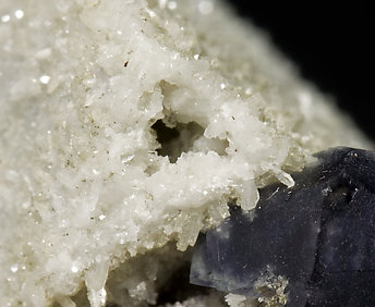 Quartz after Helvine with Fluorite and smoky Quartz. 