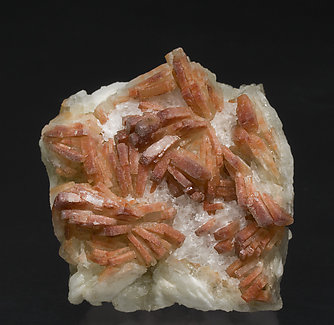 Baryte with inclusions of Hematite.