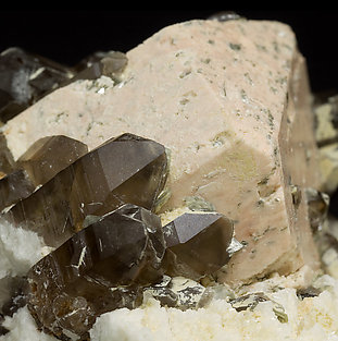 Microcline with smoky Quartz, Albite and Mica. 