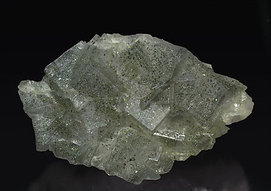 Fluorite with Chalcopyrite inclusions. 