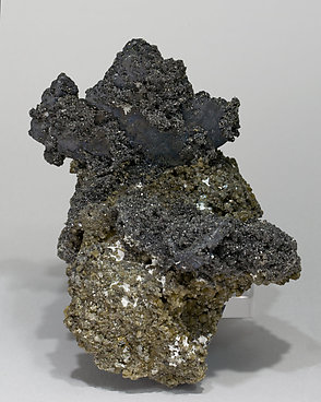 Bournonite with Siderite and Pyrite.