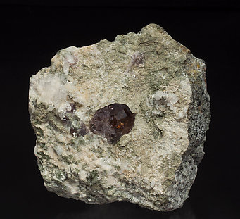 Axinite-(Fe) with Quartz and Calcite.