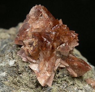 Helvine-Genthelvite with Calcite and Magnetite. 