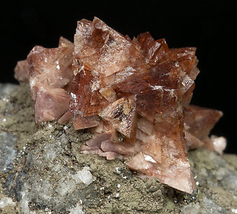 Helvine-Genthelvite with Calcite and Magnetite. 