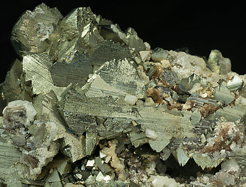 Epitactic Arsenopyrite-Marcasite with Siderite, Calcite and Muscovite. 