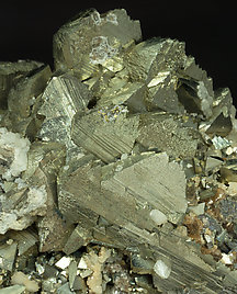 Epitactic Arsenopyrite-Marcasite with Siderite, Calcite and Muscovite. 