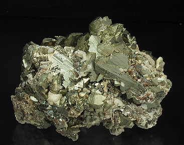 Epitactic Arsenopyrite-Marcasite with Siderite, Calcite and Muscovite. 