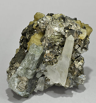 Fluorapatite with Siderite, Quartz, Stannite and Arsenopyrite. 