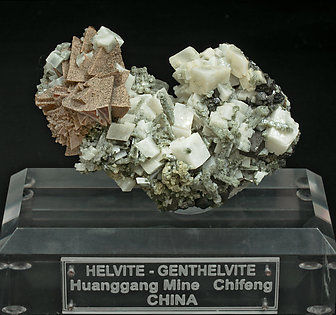 Helvine-Genthelvite, Quartz and Calcite.