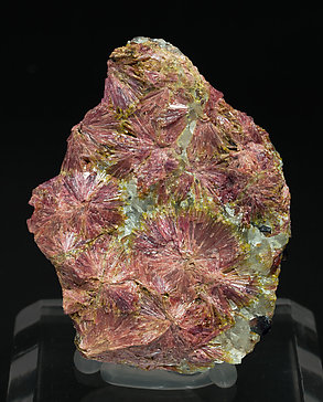 Clinozoisite (variety clinothulite) with Grossular and Quartz.