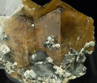 Scheelite with Quartz, Ferberite, Pyrite and Muscovite. 