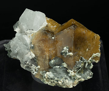 Scheelite with Quartz, Ferberite, Pyrite and Muscovite.