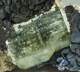 Fluorapatite with Sphalerite, Muscovite, Calcite, Siderite and Pyrite. 
