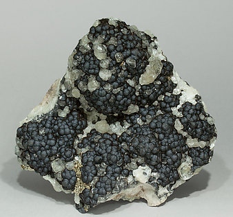 Goethite with Calcite and Pyrite. 