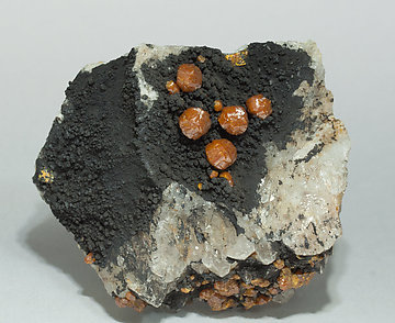 Mimetite (variety campylite) on Quartz. 