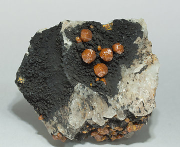 Mimetite (variety campylite) on Quartz.