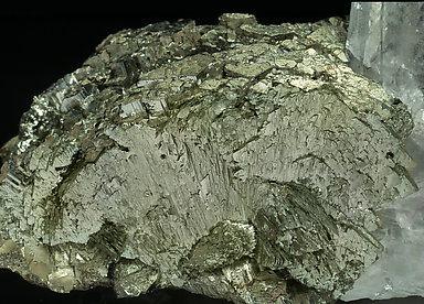 Arsenopyrite-Marcasite with Quartz with inclusions and Muscovite. 