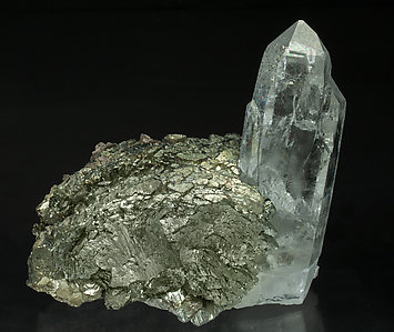 Arsenopyrite-Marcasite with Quartz with inclusions and Muscovite.