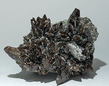 Axinite-(Mn) with Quartz. 