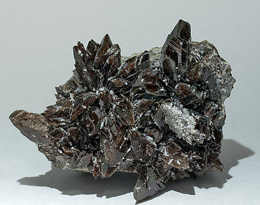 Axinite-(Mn) with Quartz.