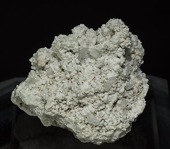 Stokesite with Albite, Microcline, smoky Quartz and Muscovite. 