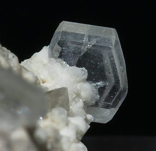 Stokesite with Albite, smoky Quartz and Muscovite. 