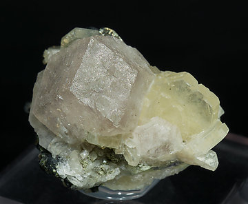 Fluorite with Fluorapatite, Arsenopyrite-Marcasite and Muscovite.