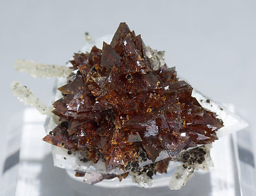 Helvine-Genthelvite with Quartz and Calcite.