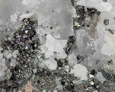 Jacobsite with Calcite and Andradite. 