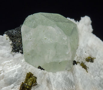 Scheelite with Wollastonite, Epidote and Amphibole. 