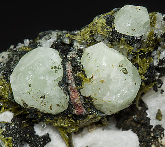 Scheelite with Wollastonite, Epidote and Amphibole. 