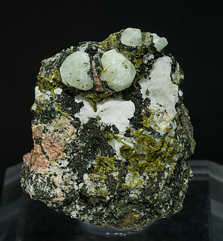 Scheelite with Wollastonite, Epidote and Amphibole. 