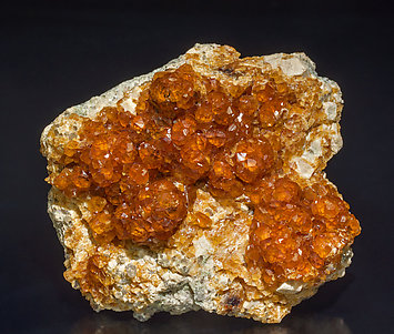 Spessartine with Feldspar.